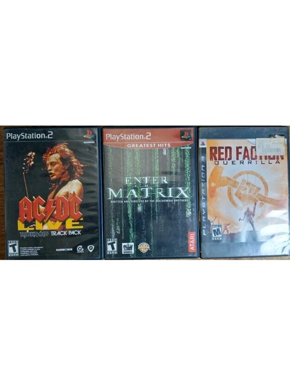 AC/DC - PS2 Kive Rockband & Enter the Matrix VGC - PS3 Red Fraction Querrilla GC